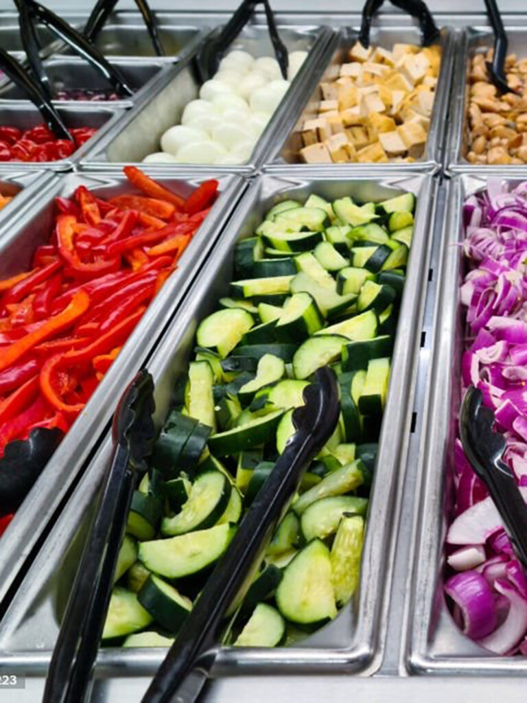Colorful vegetable salad bar display